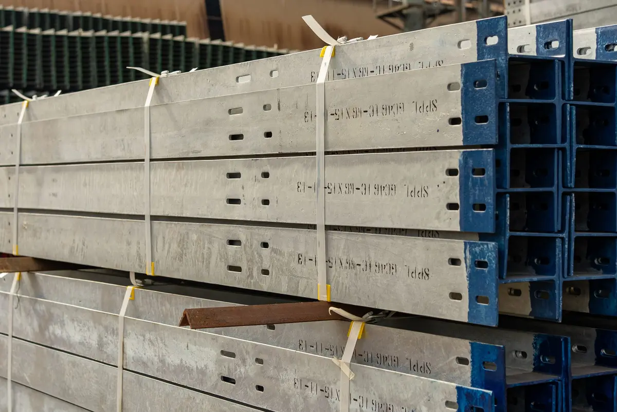 Bundled steel sections strapped for delivery